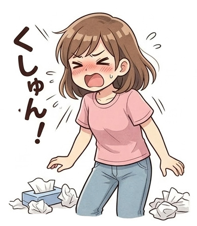 花粉症でくしゃみをする女性